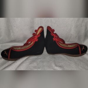 Asian themed black and red shoes